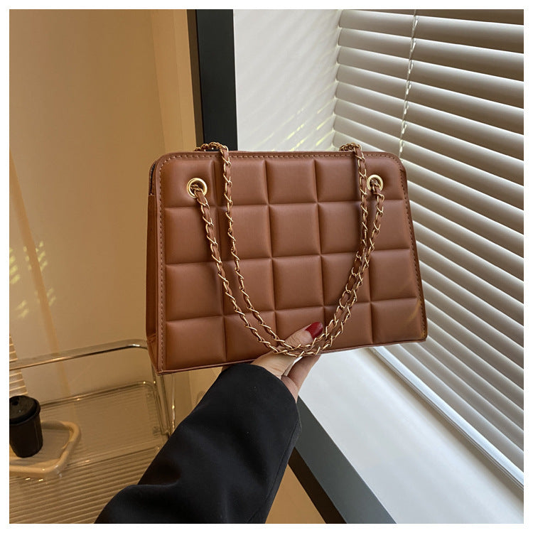 Brown square-quilted chain shoulder bag for day-to-evening styling