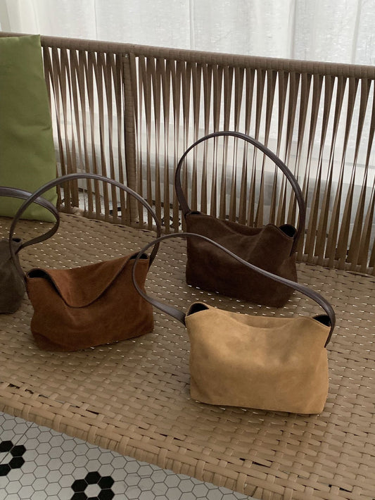 Khaki, caramel, coffee brown and gray suede-look underarm bags