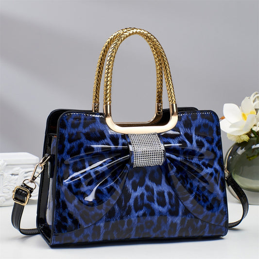 Bow Accent Shoulder Crossbody Handbag by EuroChic Tote